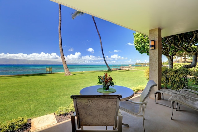 view of patio featuring a water view