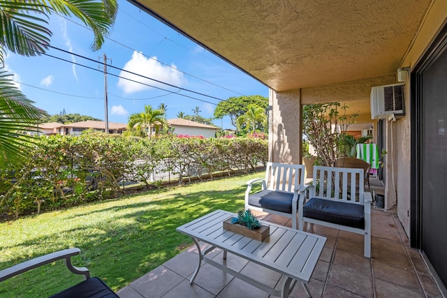 view of patio featuring an AC wall unit