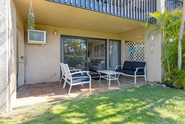 view of patio featuring a wall mounted AC, an outdoor living space, and a balcony