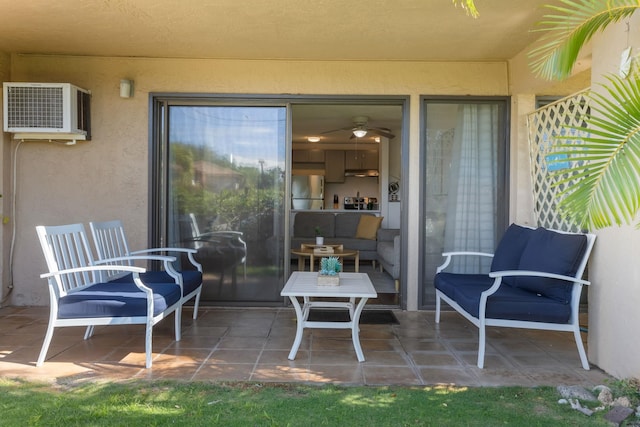 view of patio with a wall mounted AC