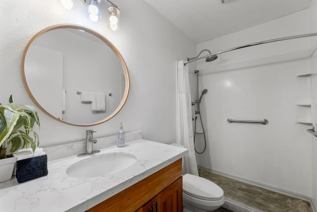 bathroom with walk in shower, hardwood / wood-style flooring, vanity, and toilet