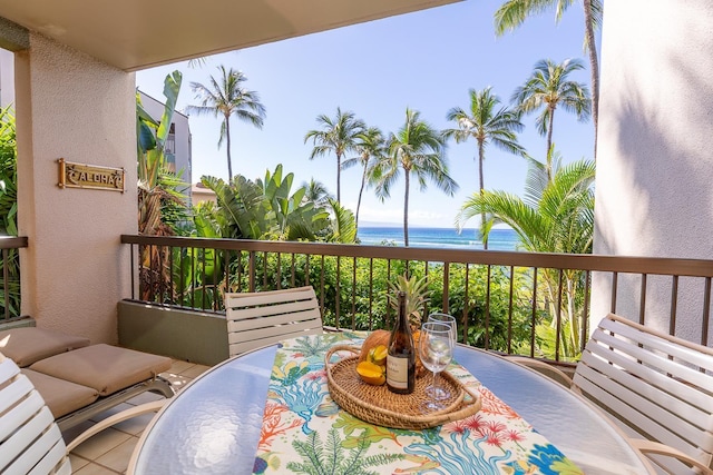 balcony featuring a water view