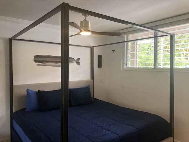 bedroom featuring crown molding