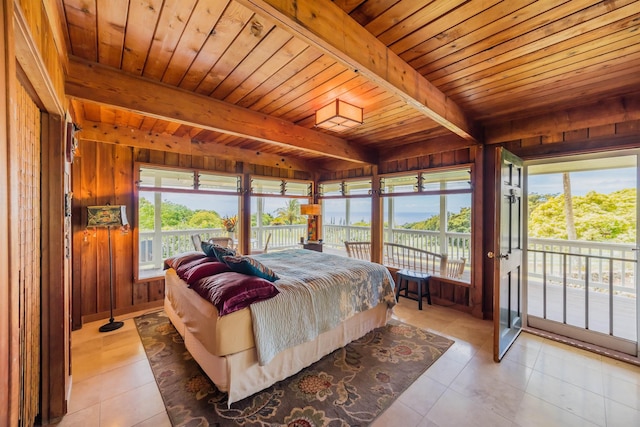 bedroom featuring access to exterior, wooden ceiling, wood walls, and light tile patterned flooring