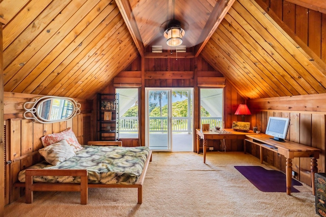 carpeted bedroom with lofted ceiling, wooden walls, and access to outside