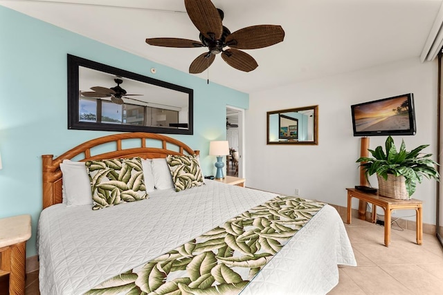 bedroom featuring a ceiling fan and light tile patterned flooring