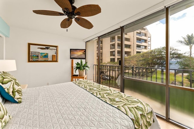 bedroom featuring access to outside and ceiling fan