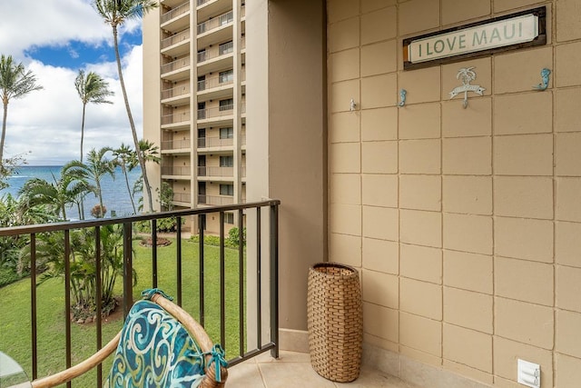 balcony featuring a water view