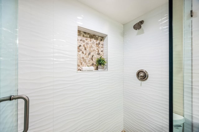 bathroom featuring a stall shower