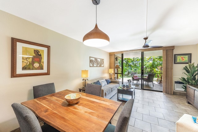 dining room featuring light tile patterned floors, floor to ceiling windows, and ceiling fan