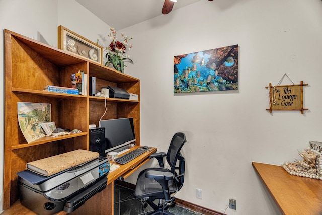 home office featuring baseboards and ceiling fan