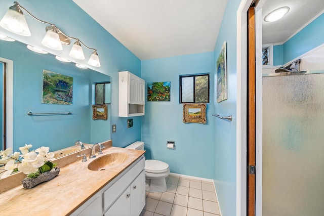 full bath with a stall shower, baseboards, toilet, tile patterned floors, and vanity