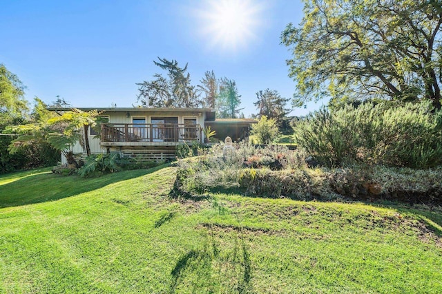 view of yard featuring a deck