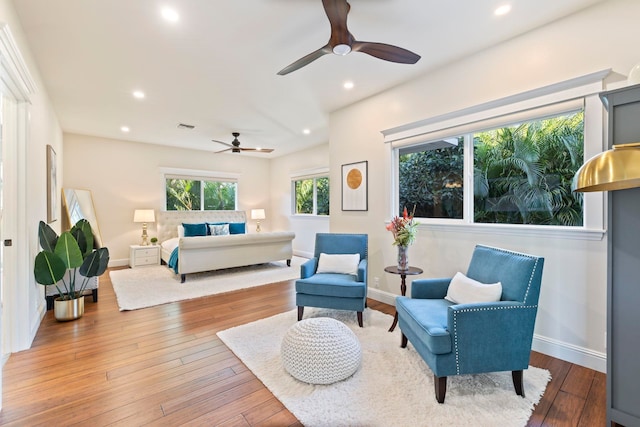 bedroom featuring ceiling fan and hardwood / wood-style flooring