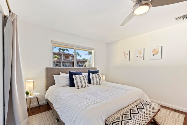 bedroom featuring ceiling fan and wood-type flooring