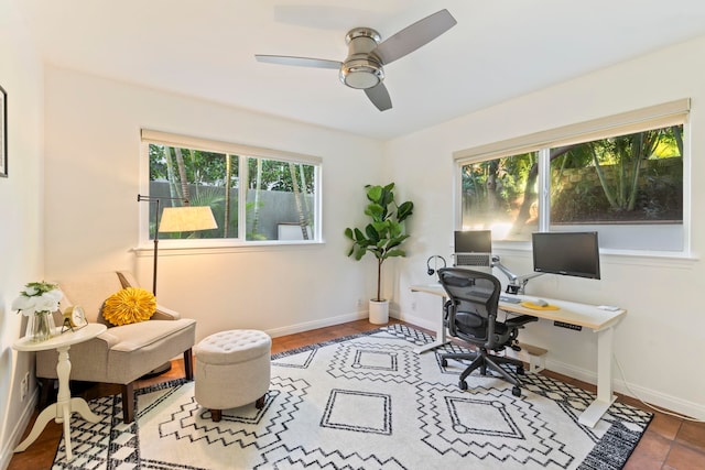 office with ceiling fan and plenty of natural light