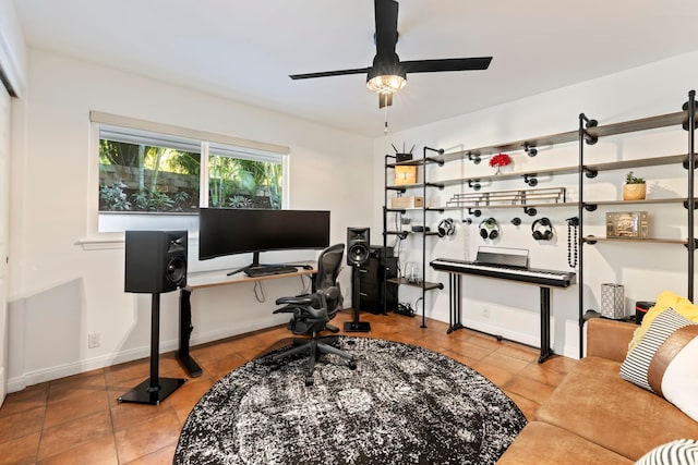 home office featuring ceiling fan and tile patterned floors