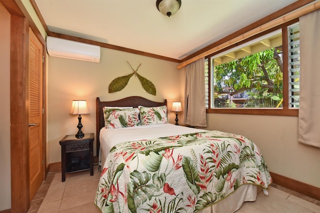 tiled bedroom featuring a wall mounted AC and crown molding