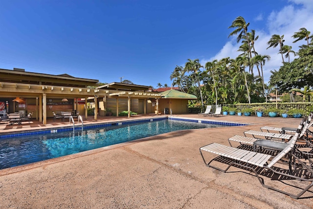 view of pool featuring a patio area