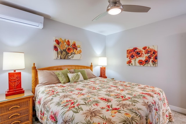 tiled bedroom featuring a wall unit AC and ceiling fan