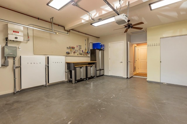 garage with ceiling fan and a garage door opener