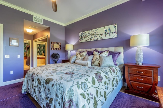 bedroom featuring ensuite bathroom, ceiling fan, and crown molding