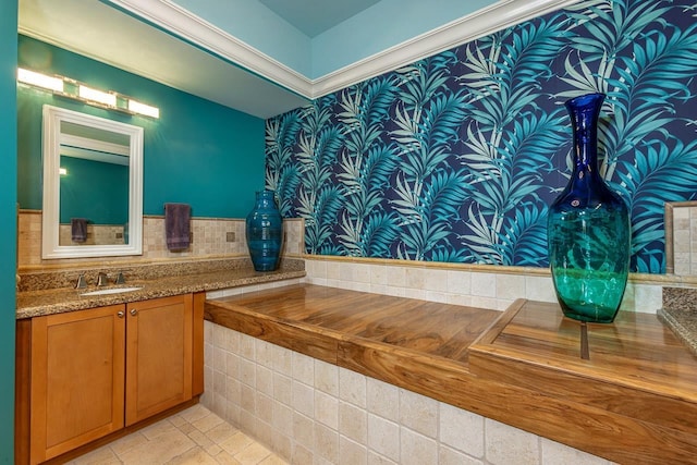 bathroom featuring tile patterned floors and vanity