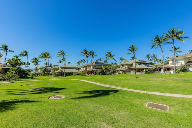 view of community featuring a lawn