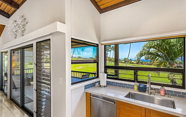 10 Wailea Ekolu Pl Unit 1204, Kihei, HI 96753 - kitchen featuring dishwasher, a wood ceiling with exposed beams, high vaulted ceiling, light tile patterned floors, and tasteful backsplash