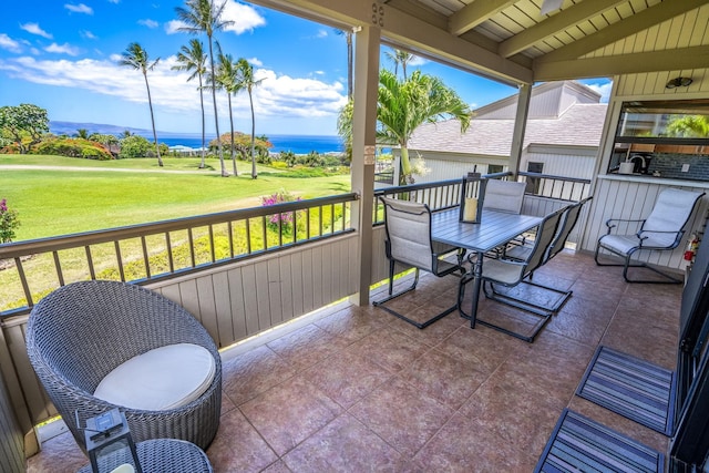 10 Wailea Ekolu Pl Unit 1204, Kihei, HI 96753 - view of patio featuring a water view, view of golf course, and outdoor dining space