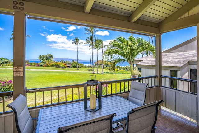 10 Wailea Ekolu Pl Unit 1204, Kihei, HI 96753 - wooden deck featuring a water view, outdoor dining area, a yard, and view of golf course