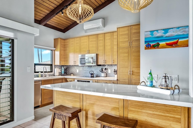 kitchen featuring a wall mounted air conditioner, wooden ceiling, vaulted ceiling with beams, kitchen peninsula, and stainless steel appliances