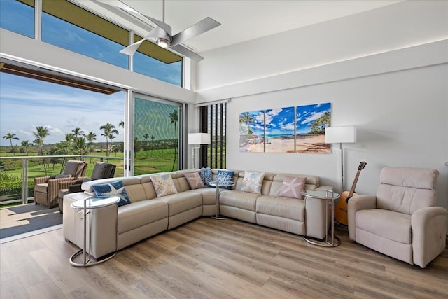 209 Holokahiki Ln Unit 103, Kihei, HI 96753 - living area featuring ceiling fan and wood finished floors