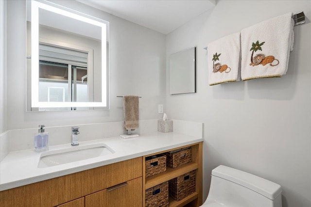 209 Holokahiki Ln Unit 103, Kihei, HI 96753 - bathroom featuring vanity and toilet