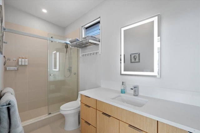 209 Holokahiki Ln Unit 103, Kihei, HI 96753 - bathroom with toilet, vanity, and a shower stall
