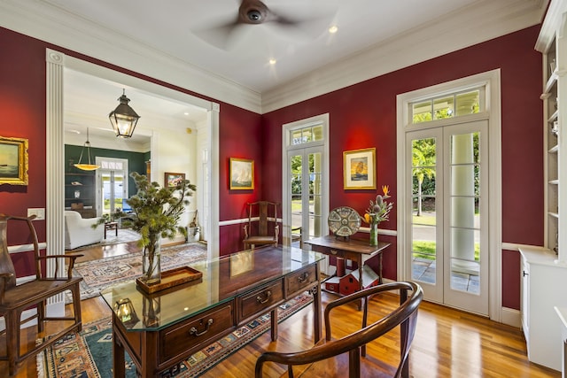 dining area with french doors and light hardwood / wood-style floors