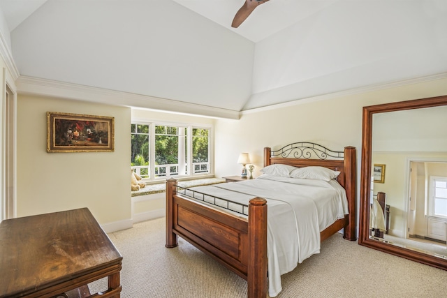 carpeted bedroom with ceiling fan, crown molding, and high vaulted ceiling