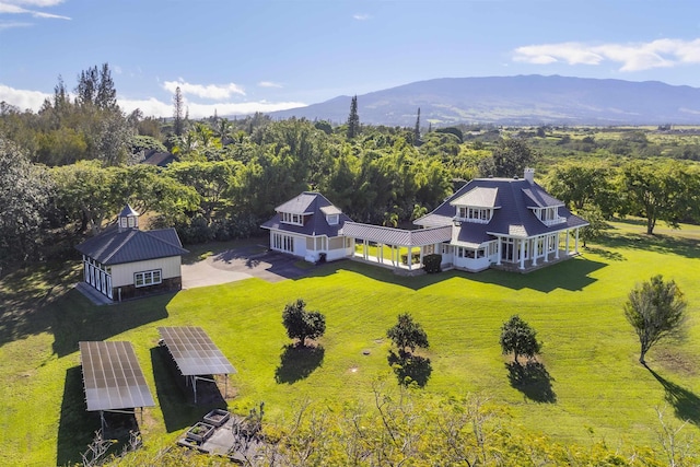 drone / aerial view featuring a mountain view