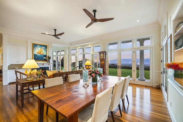 dining area featuring crown molding, french doors, ceiling fan, and hardwood / wood-style floors