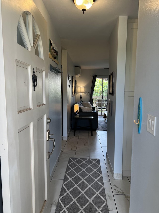 hallway with a wall mounted air conditioner