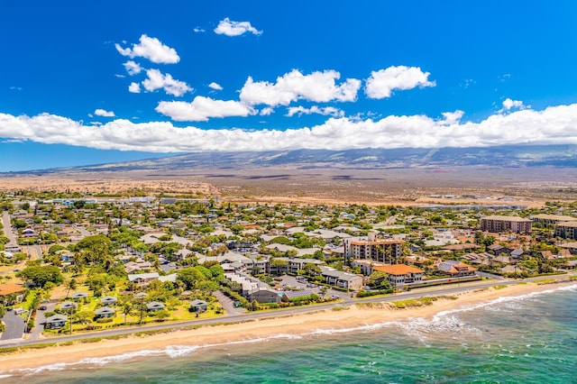 bird's eye view with a beach view and a water and mountain view