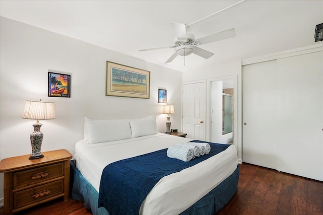 bedroom featuring a ceiling fan, a closet, and wood finished floors