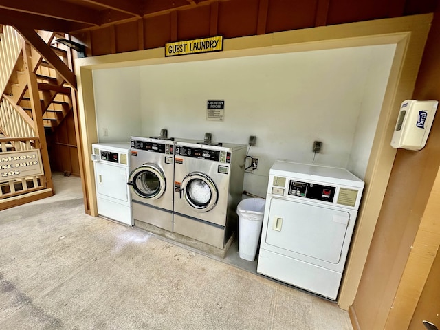 washroom featuring washer and clothes dryer