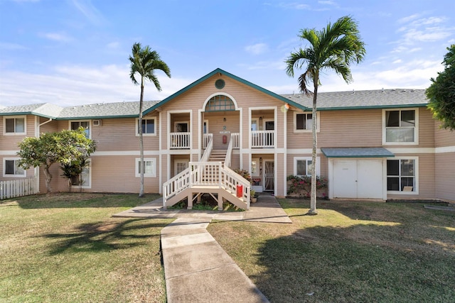 view of front facade with a front lawn