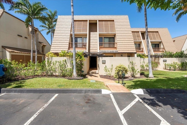 2777 S Kihei Rd Unit L-109, Kihei, HI 96753 - view of building exterior with uncovered parking