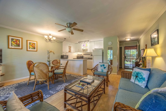 living room featuring crown molding, light wood-type flooring, and ceiling fan with notable chandelier