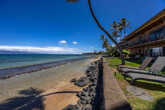 view of water feature with a beach view