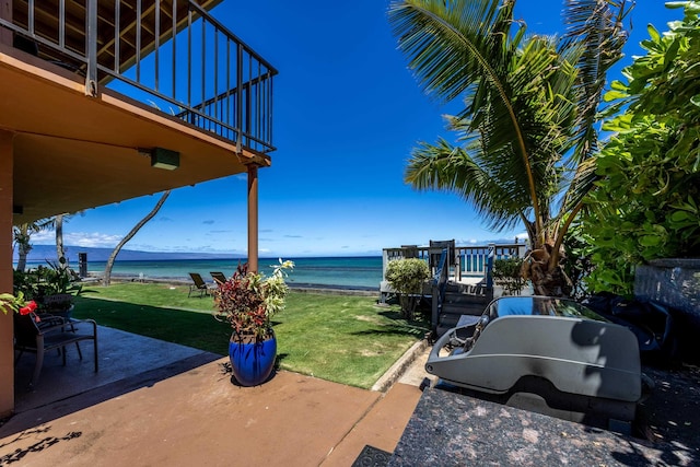 property view of water featuring a beach view