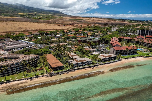 birds eye view of property with a beach view and a water and mountain view