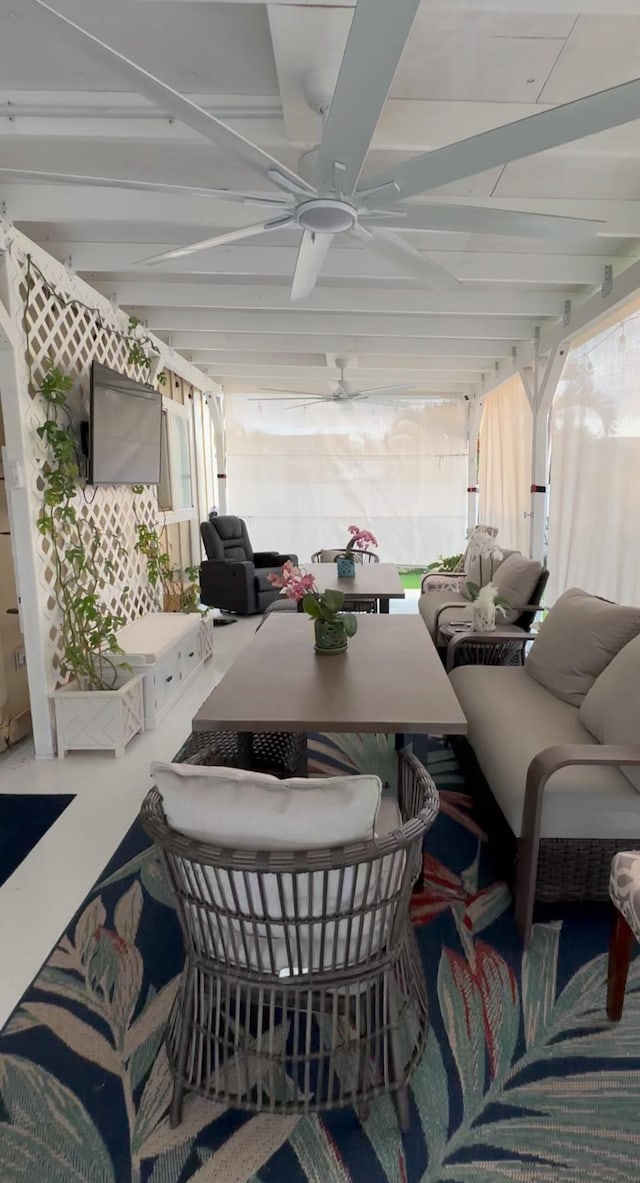 view of patio / terrace with ceiling fan and an outdoor hangout area